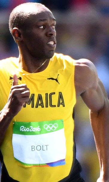 Usain Bolt blows past competition, including ex-NFL player in 100 heat